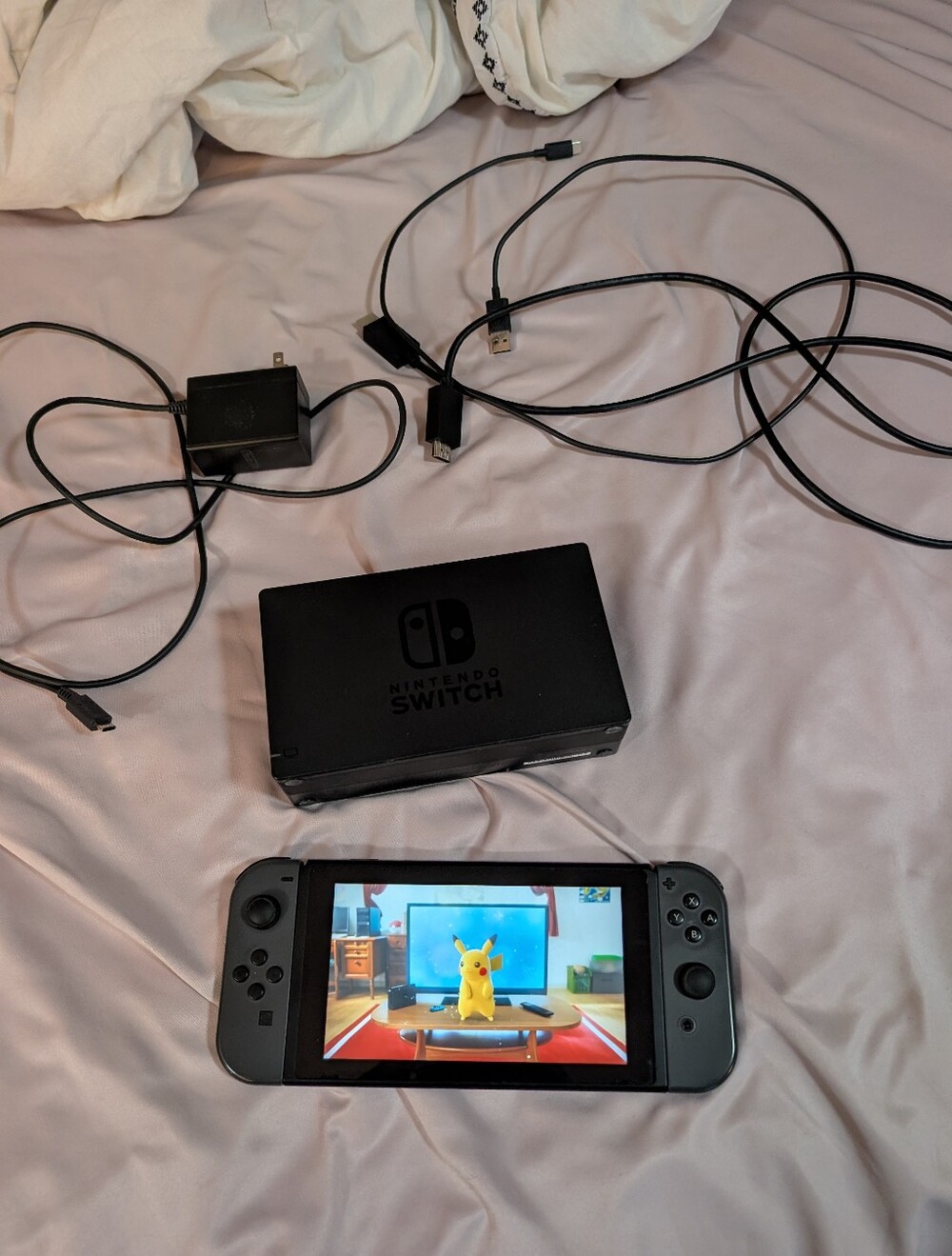 Nintendo Switch with Several Games Controllers And Accessories